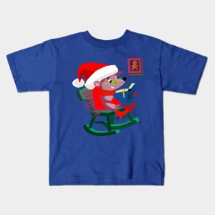 Hedgehog is sitting by the fire and waiting for Christmas Kids T-Shirt